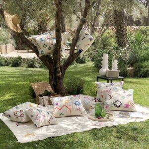 Handwoven Moroccan wool picnic blanket with neon embroidery